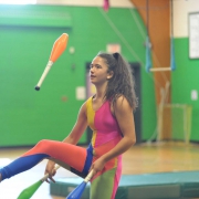 photo of a high school student performing a juggling routine