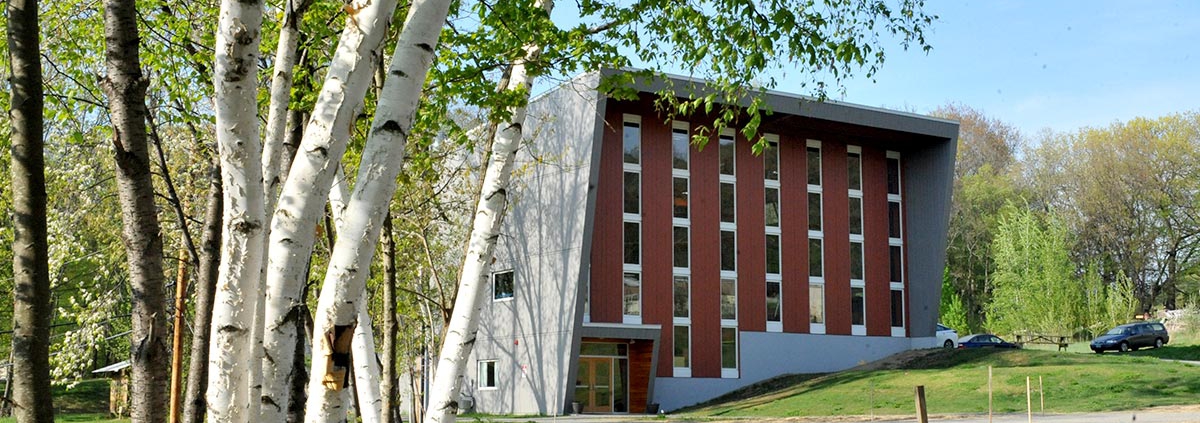 photo of the NECCA building in the springtime