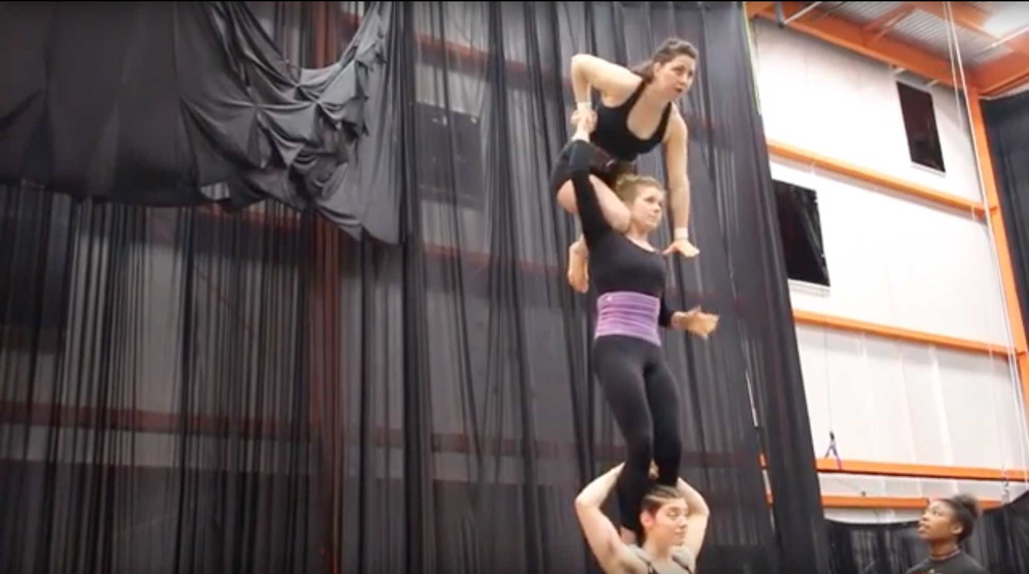 necca-fractured-interview-june-2019 photo of three women performing a three high for the show Fractured, at the NEw England CEnter for Circus Arts